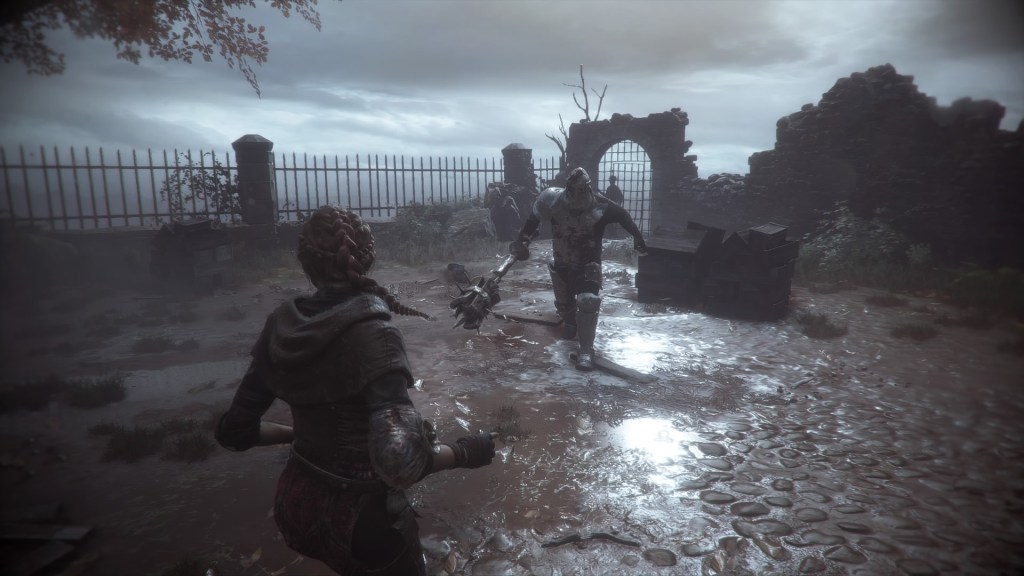 An armor-clad man wielding a makeshift mace walks towards Amicia. 