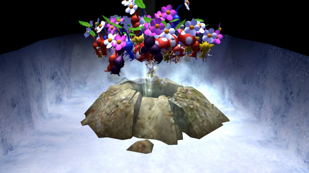 There's a hole in the ground and a large group of pikmin are jumping into it. 