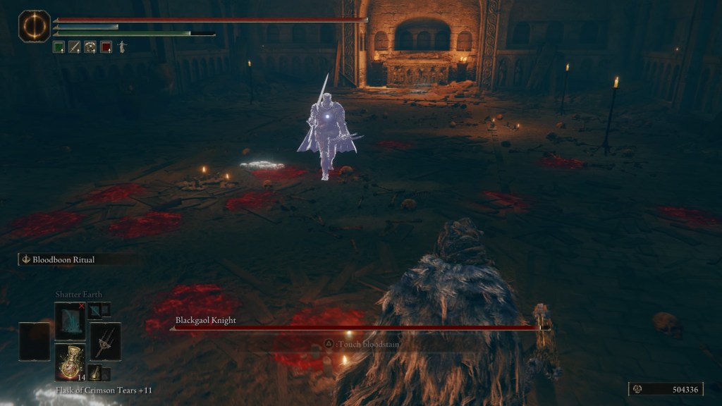 Blackgaol Knight is approaching my character. He's carrying a large greatsword over his shoulder with his right hand and holds a crossbow in his left. There are many bloodstains on the ground, indicating quite a few other people fell victim to him. 