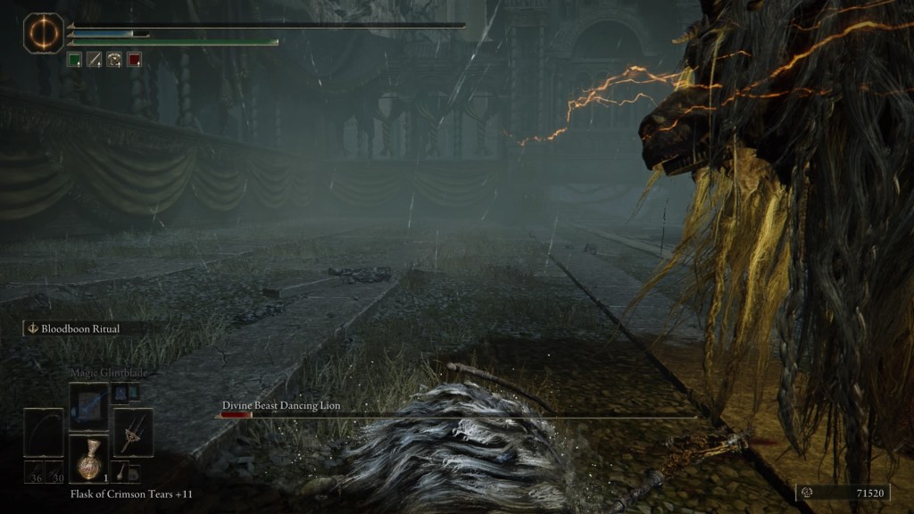 My tarnished player character dies to Divine Beast Dancing Lion. The Dancing Lion is notably very low health, but my health was even lower. The Divine Beast is standing to the right of the screen, with jolts of electricity sticking out. It's a bit hard to tell what you're looking at from this viewpoint.