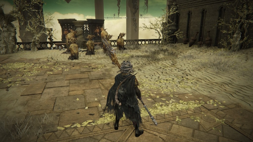 My player character stands before a group of six... things in the distance. They wear yellow robes and their heads fray like tree branches. Two of them stand holding candles and four of them kneel down in prayer.