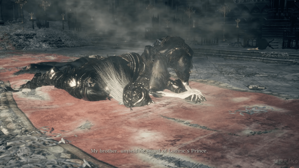 Lorian lies collapsed on the floor. Lothric is holding his hand while saying, "My brother, unyielding sword of Lothric's Prince."