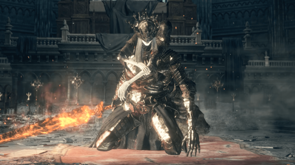 Lorian stands again. Well, partially. He's standing on his knees. Lothric is on Lorian's back with his spindly arms wrapped around him.