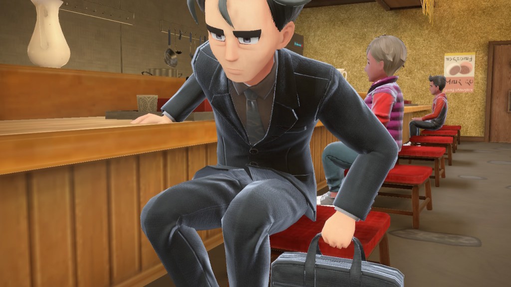 Larry gets out of his seat.