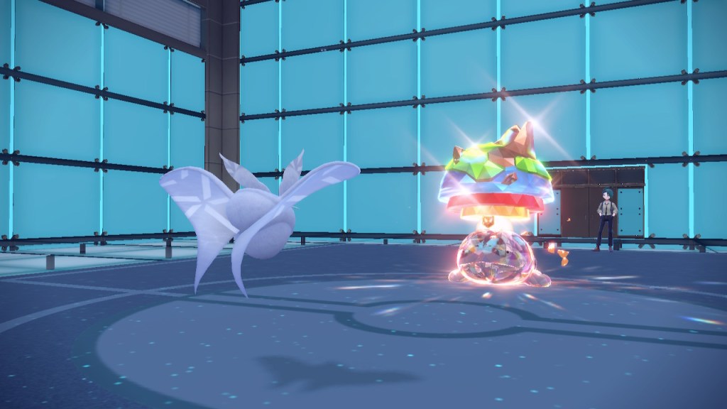 A picture of Rika's terastalized clodsire against my frosmoth. Clodsire has a bright crystal texture added, a shiny appearance, and a new hat that looks like a globe cut in half with the major layers cascading downwards.